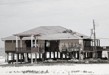 wind damage - spray foam can help prevent uplift to Gilbert roofs